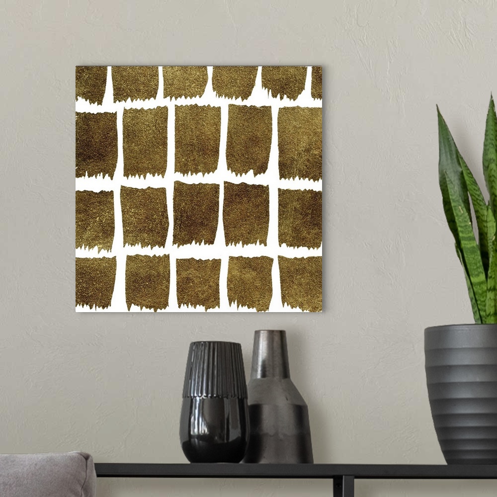 A modern room featuring Square decorative artwork of dark gold square shapes  in rows on a white background.