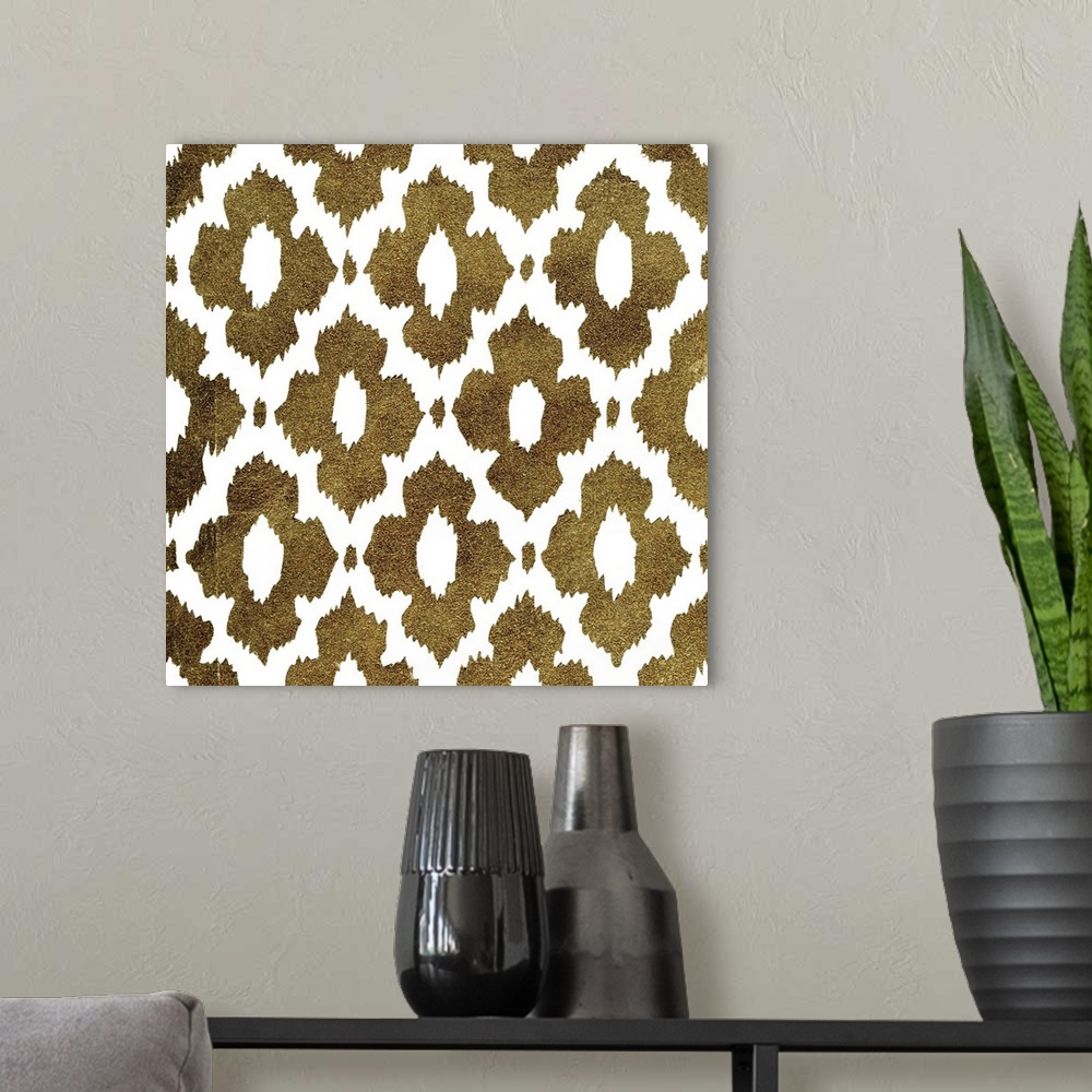 A modern room featuring Square decorative artwork of dark gold medallion designs in rows on a white background.