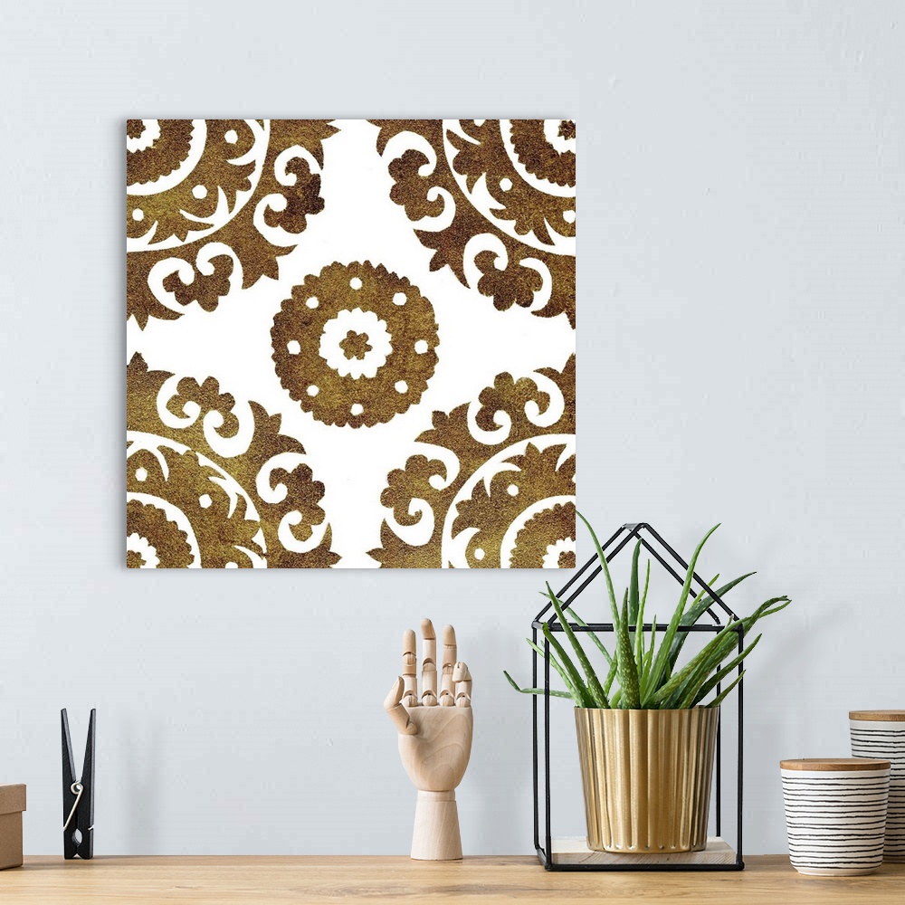 A bohemian room featuring Square decorative artwork of dark gold medallions in rows on a white background.