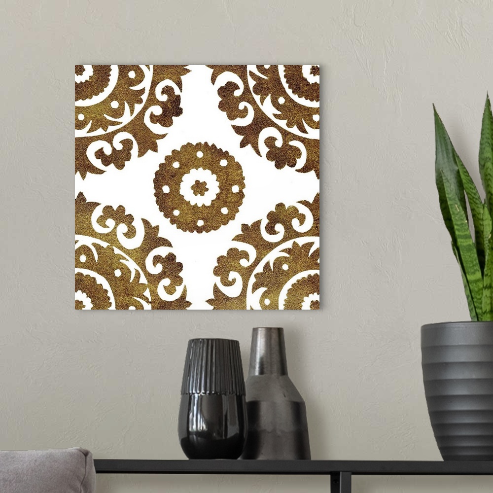 A modern room featuring Square decorative artwork of dark gold medallions in rows on a white background.