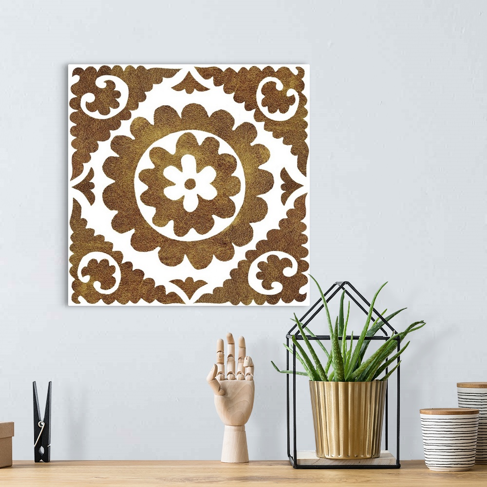 A bohemian room featuring Square decorative artwork of dark gold floral tile pattern on a white background.