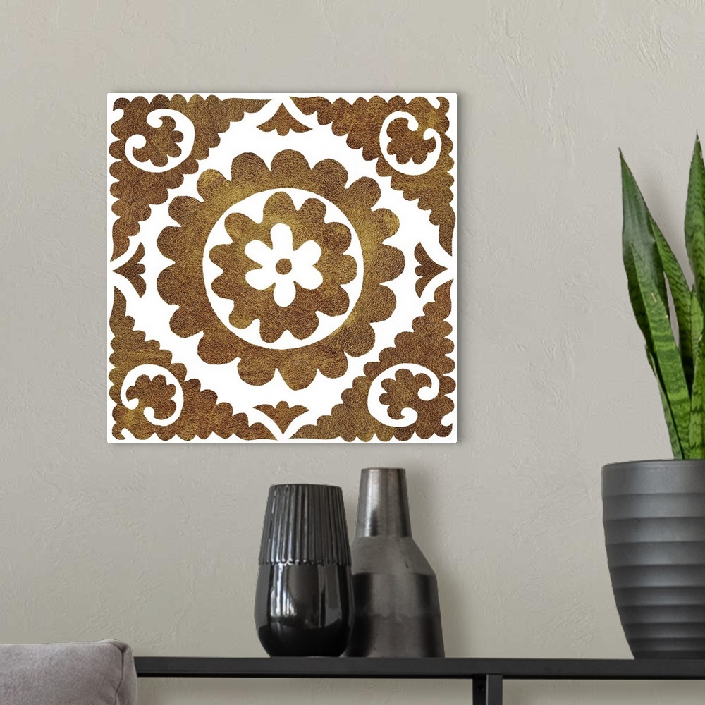 A modern room featuring Square decorative artwork of dark gold floral tile pattern on a white background.