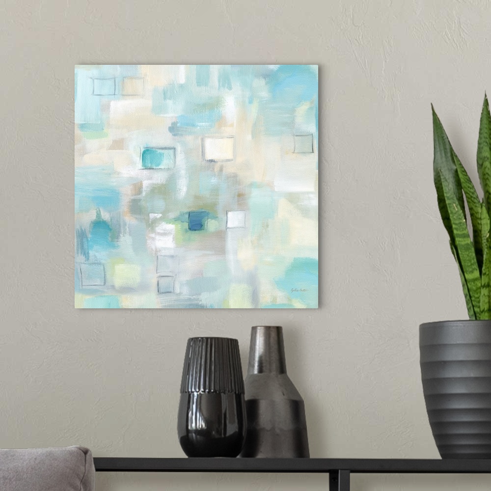 A modern room featuring Square abstract watercolor painting in blurred square shapes in muted tones of brown, blue and gr...