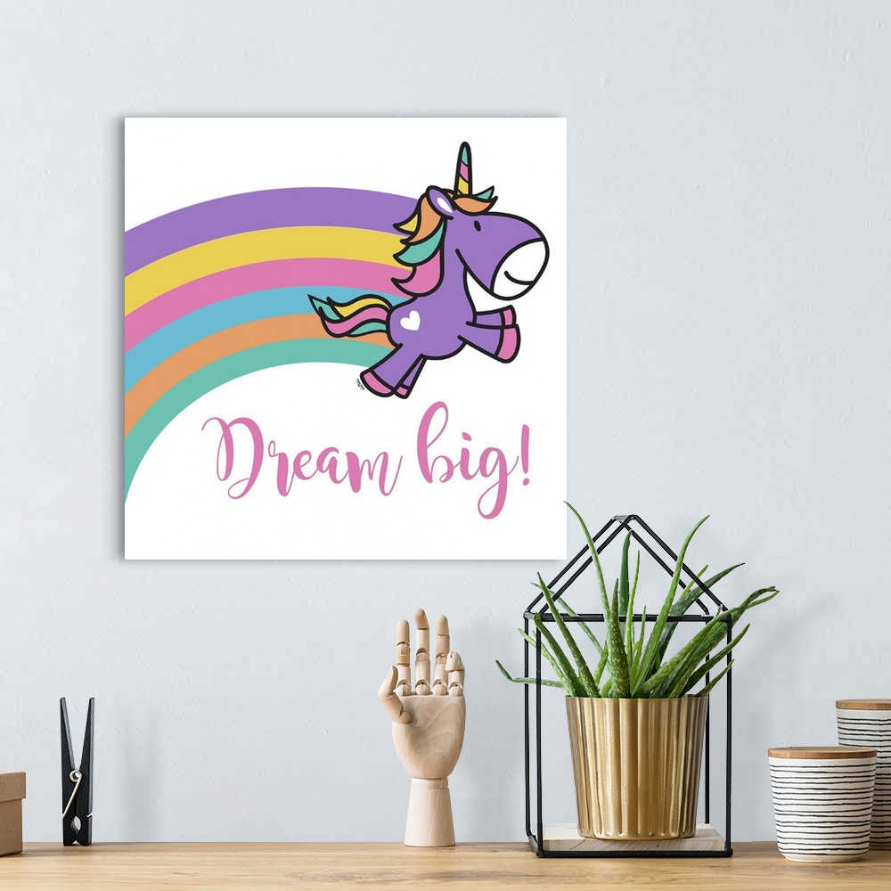 A bohemian room featuring Adorable decorative illustration of a purple unicorn with a rainbow trailing behind it and "Dream...