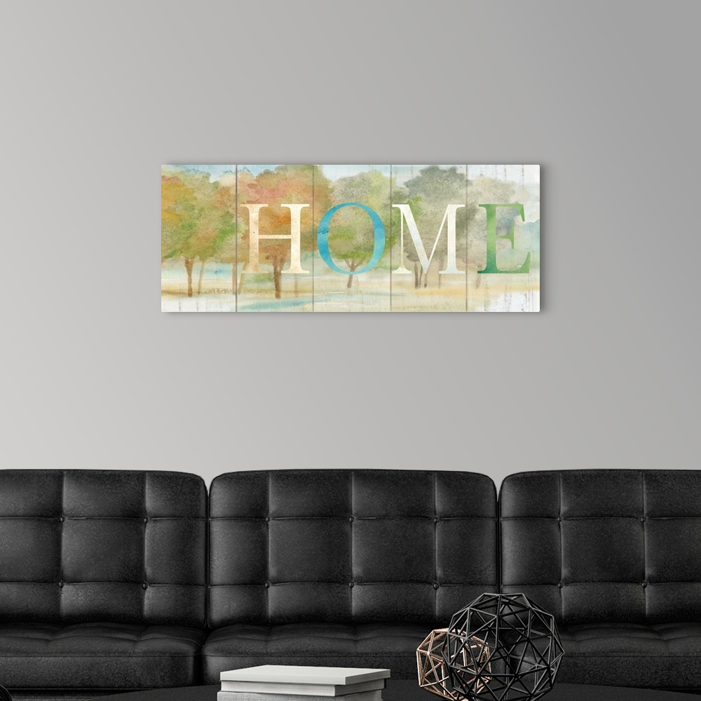 A modern room featuring "Home" in blue, white and green over a watercolor image of fall colored trees with a wood plank a...