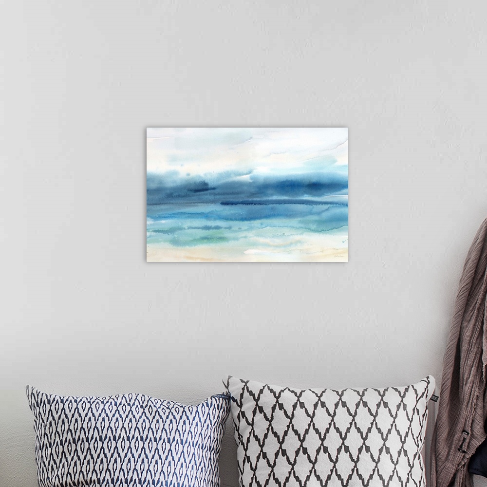 A bohemian room featuring A watercolor painting of an abstract seascape in muted tones of blue.