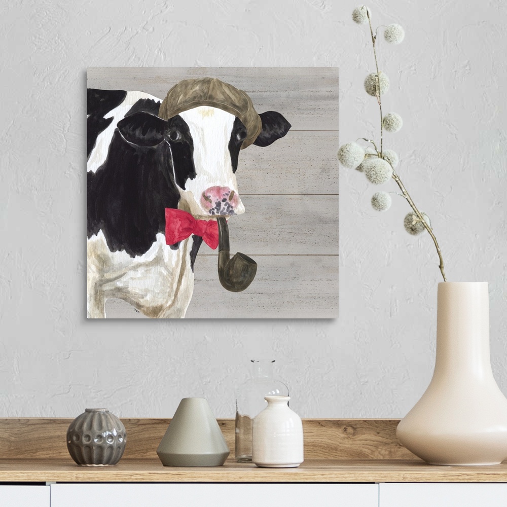 A farmhouse room featuring A black and white cow with a hat on head and pipe in mouth against of grey wood background.
