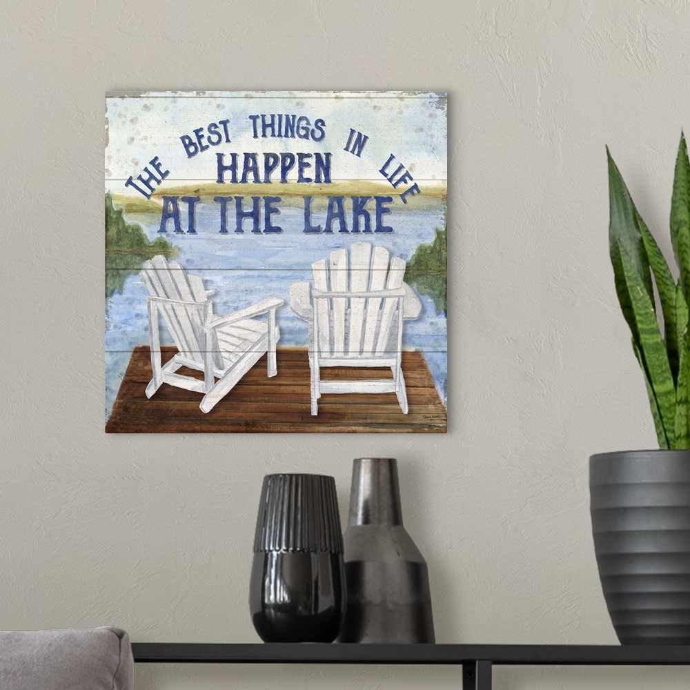 A modern room featuring "The Best Things In Life Happen At The Lake" and a watercolor painting of two chairs on a dock at...