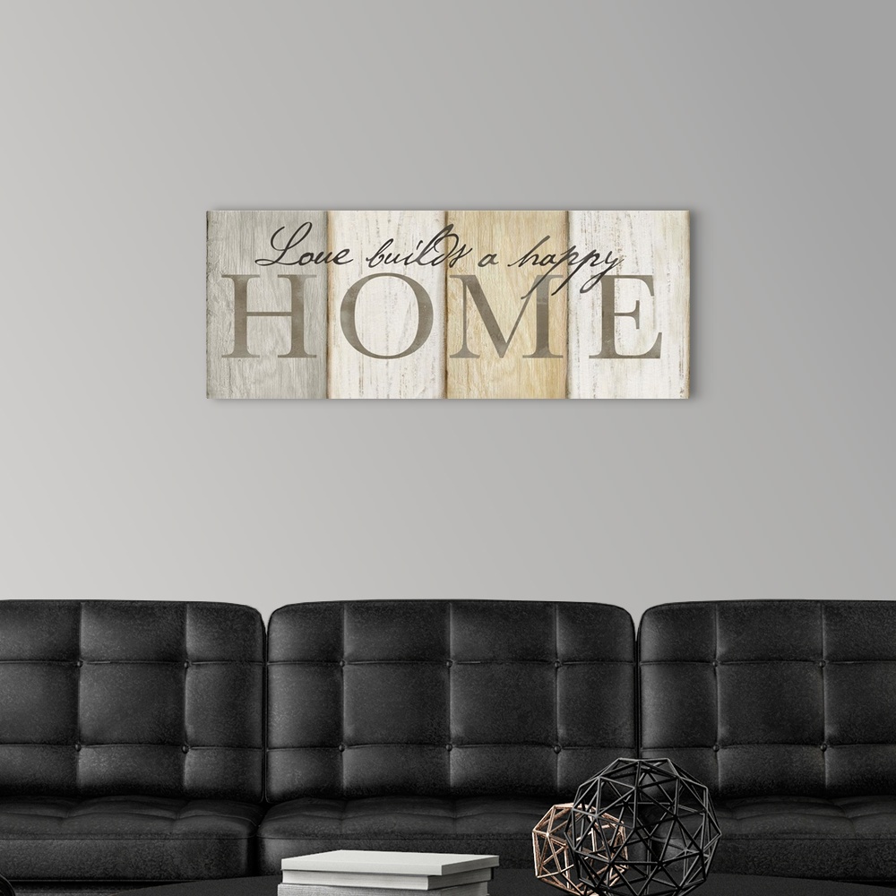 A modern room featuring "Love builds a happy Home" on a neutral multi-colored wood plank background.