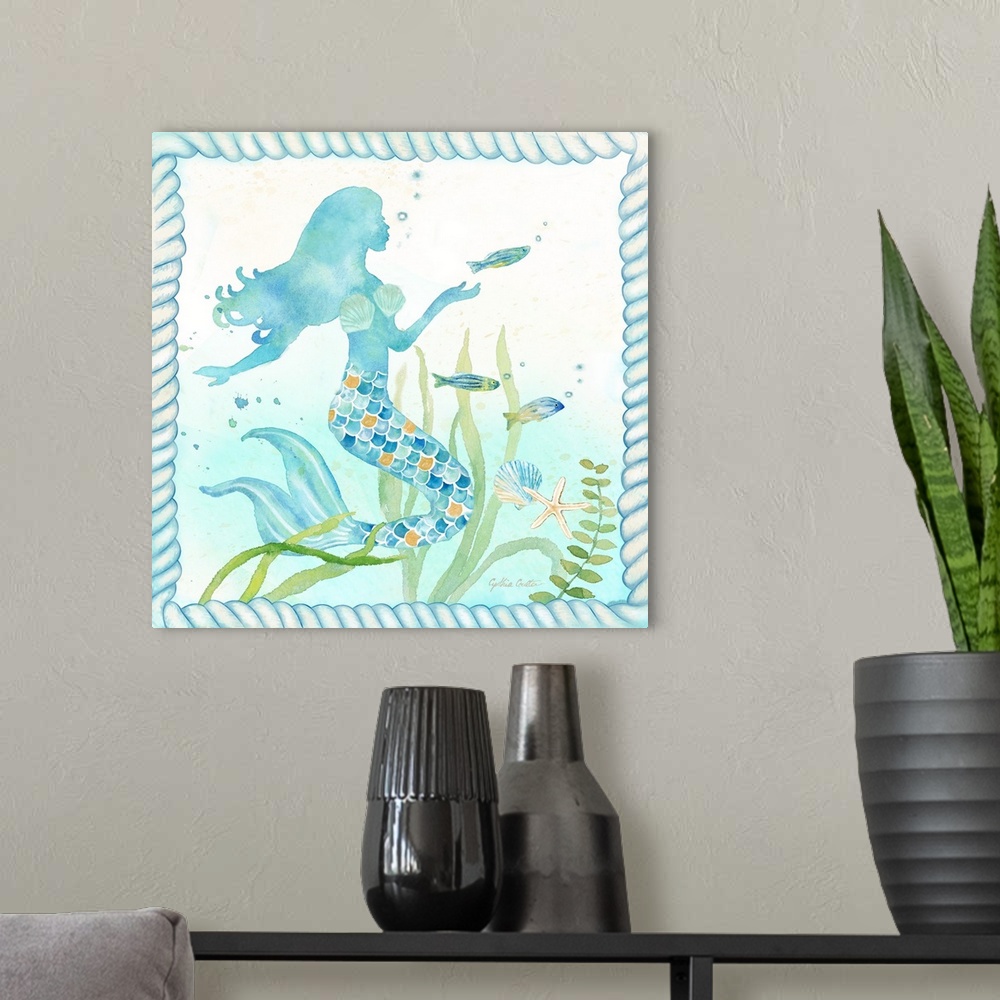 A modern room featuring Watercolor painting of a mermaid surrounded by fish, coral and seaweed along with shells, bordere...