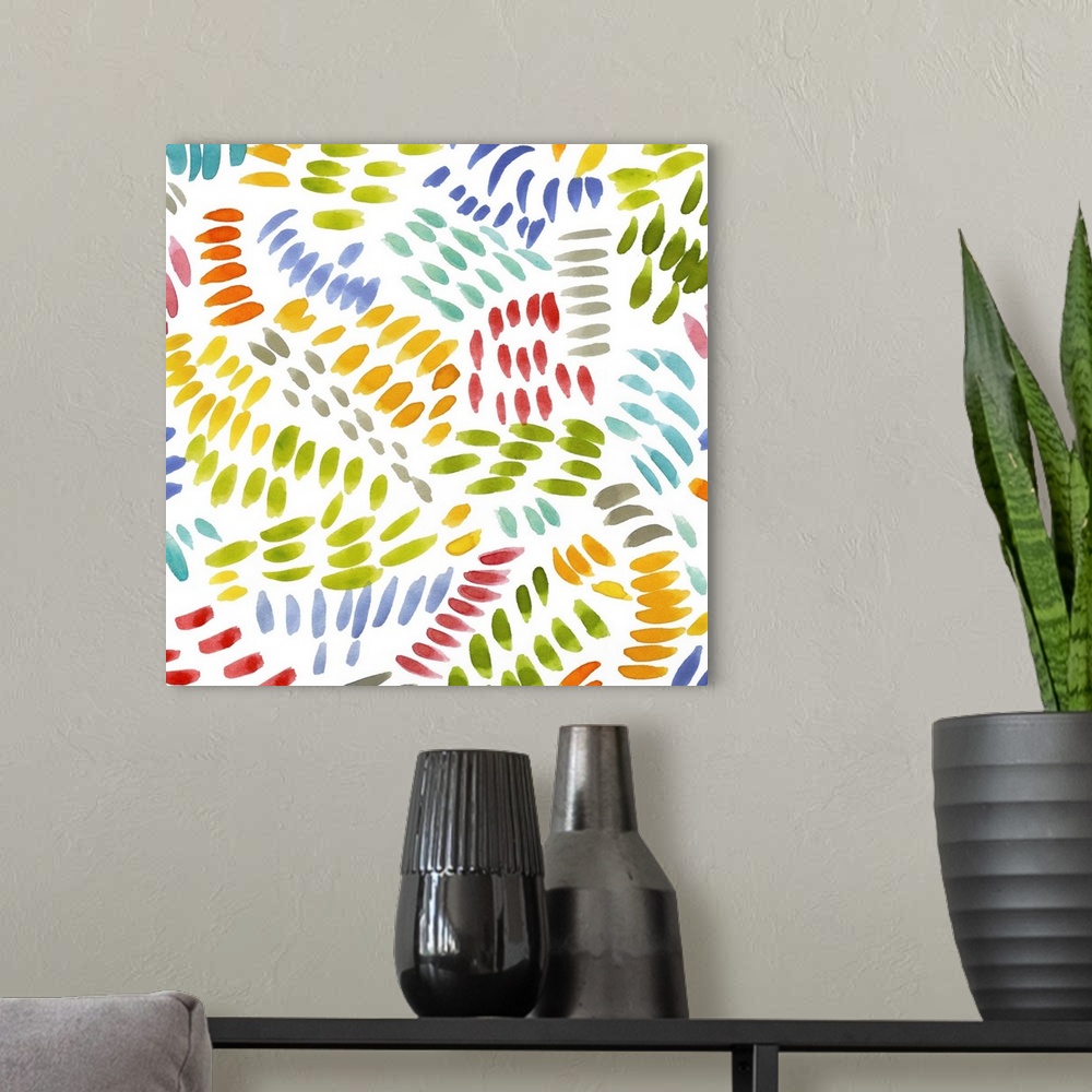 A modern room featuring Square decorative artwork of multi-colored brush strokes in a curved pattern on a white background.