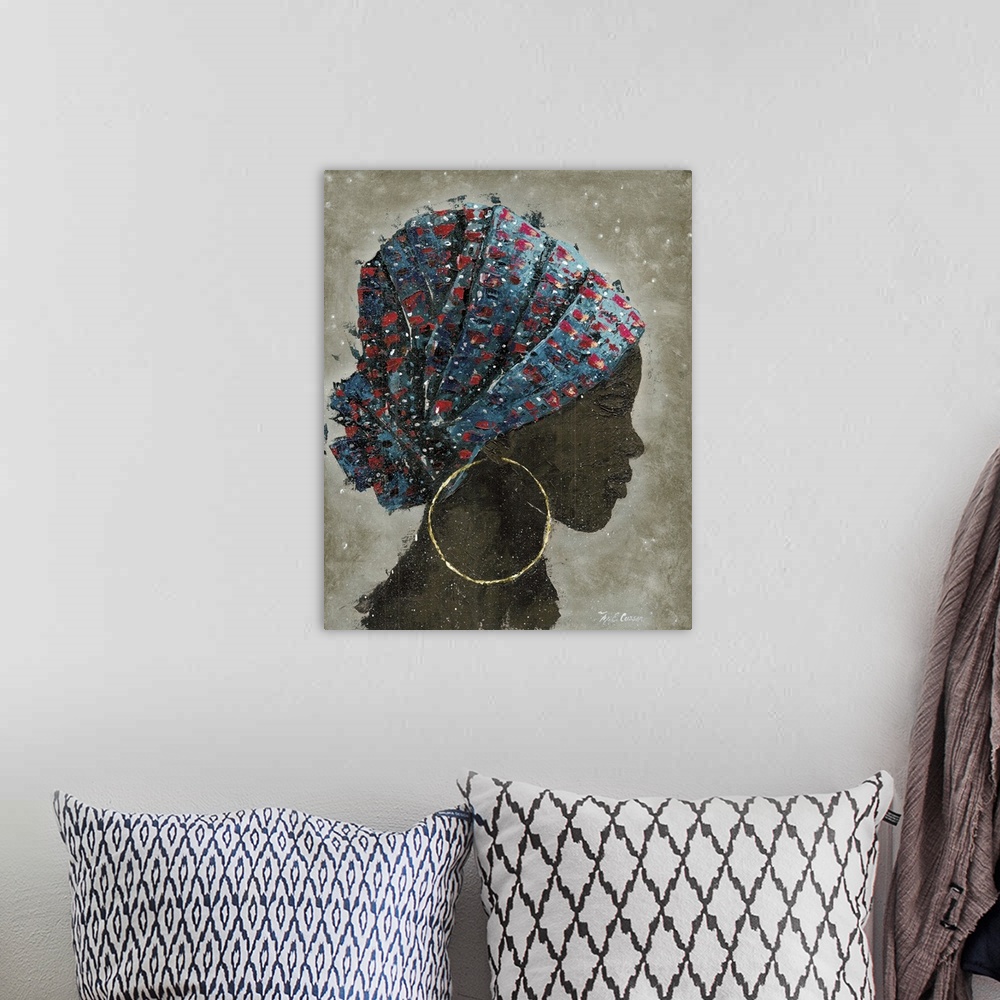 A bohemian room featuring A textured painting of a portrait of a woman with large hooped earrings and a colorful head scarf.