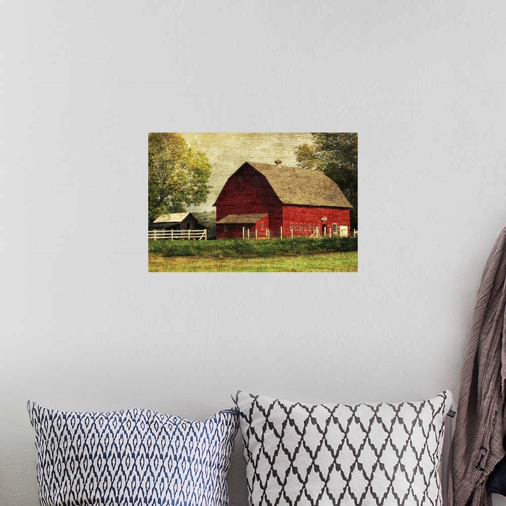 A bohemian room featuring Image of a large red barn framed by trees with a vintage, distressed overlay.
