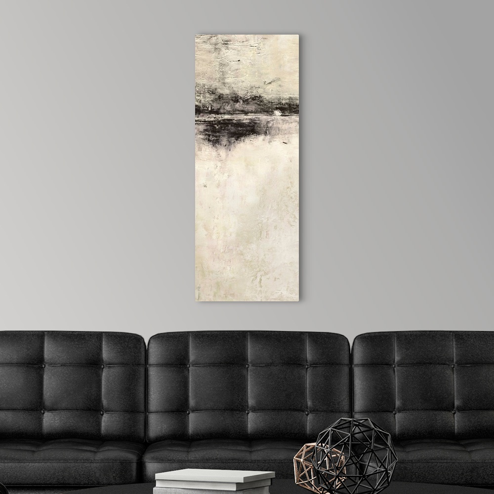A modern room featuring A long vertical abstract painting of a rough stroked black horizontal line on textured beige.