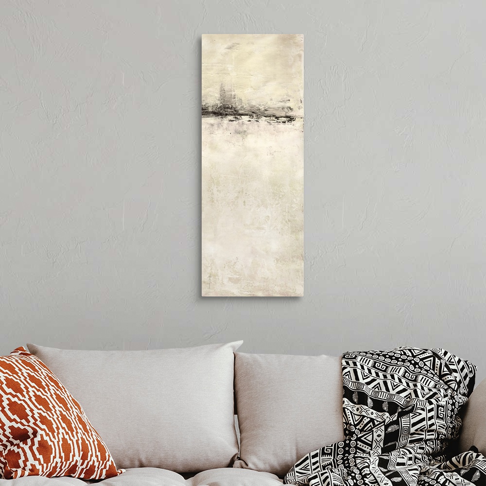 A bohemian room featuring A long vertical abstract painting of a rough stroked black horizontal line on textured beige.
