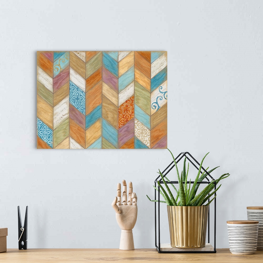 A bohemian room featuring Artwork of multi-colored wood shapes making a chevron design featuring a floral pattern throughout.