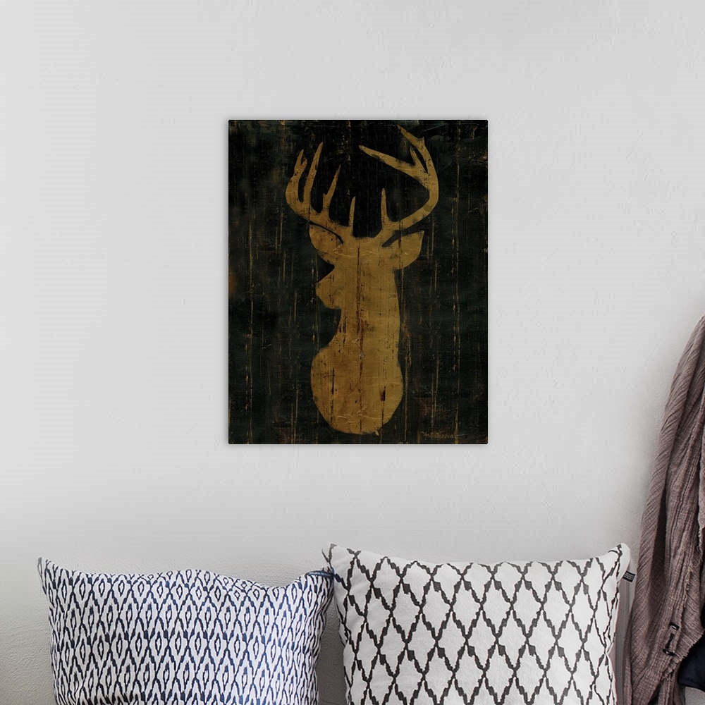 A bohemian room featuring A rustic decorative image of a deer in golden brown with a wood texture.