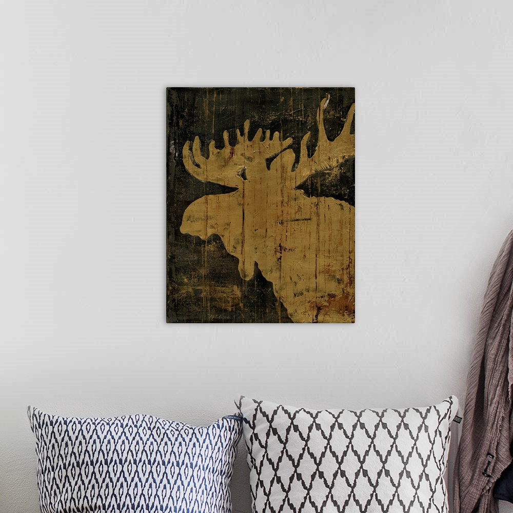 A bohemian room featuring A rustic decorative image of a moose in golden brown with a wood texture.