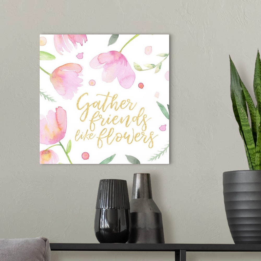 A modern room featuring "Gather friends like flowers" in gold with pink tulips.