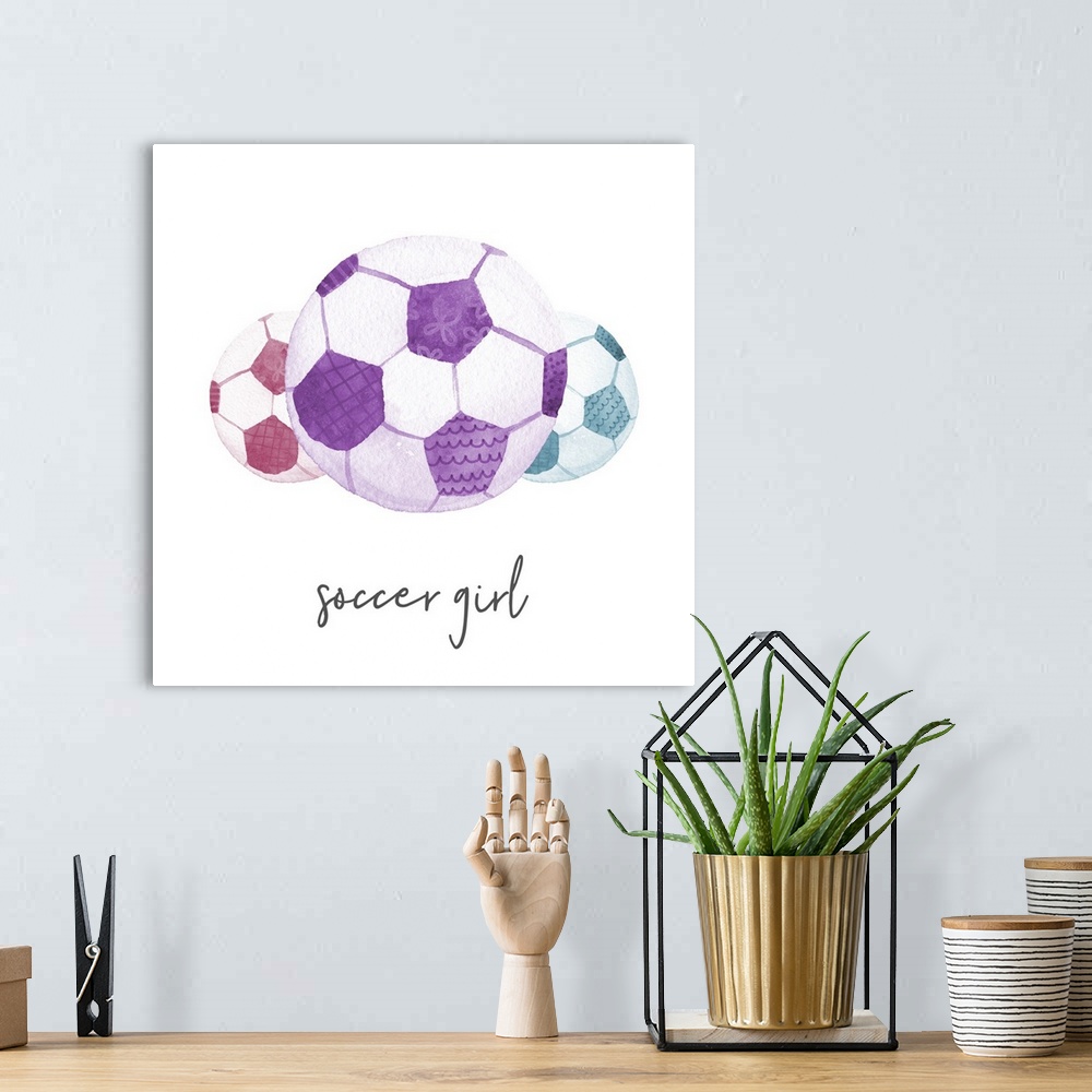 A bohemian room featuring A watercolor image of a group of colorful patterned soccer balls and the text 'soccer girl.'