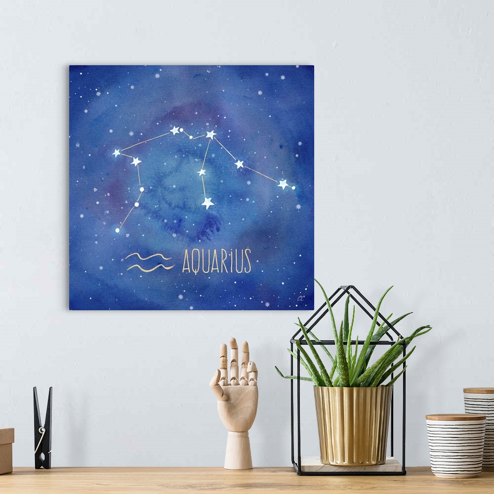 A bohemian room featuring Square artwork of the constellation of Aquarius with the symbol.