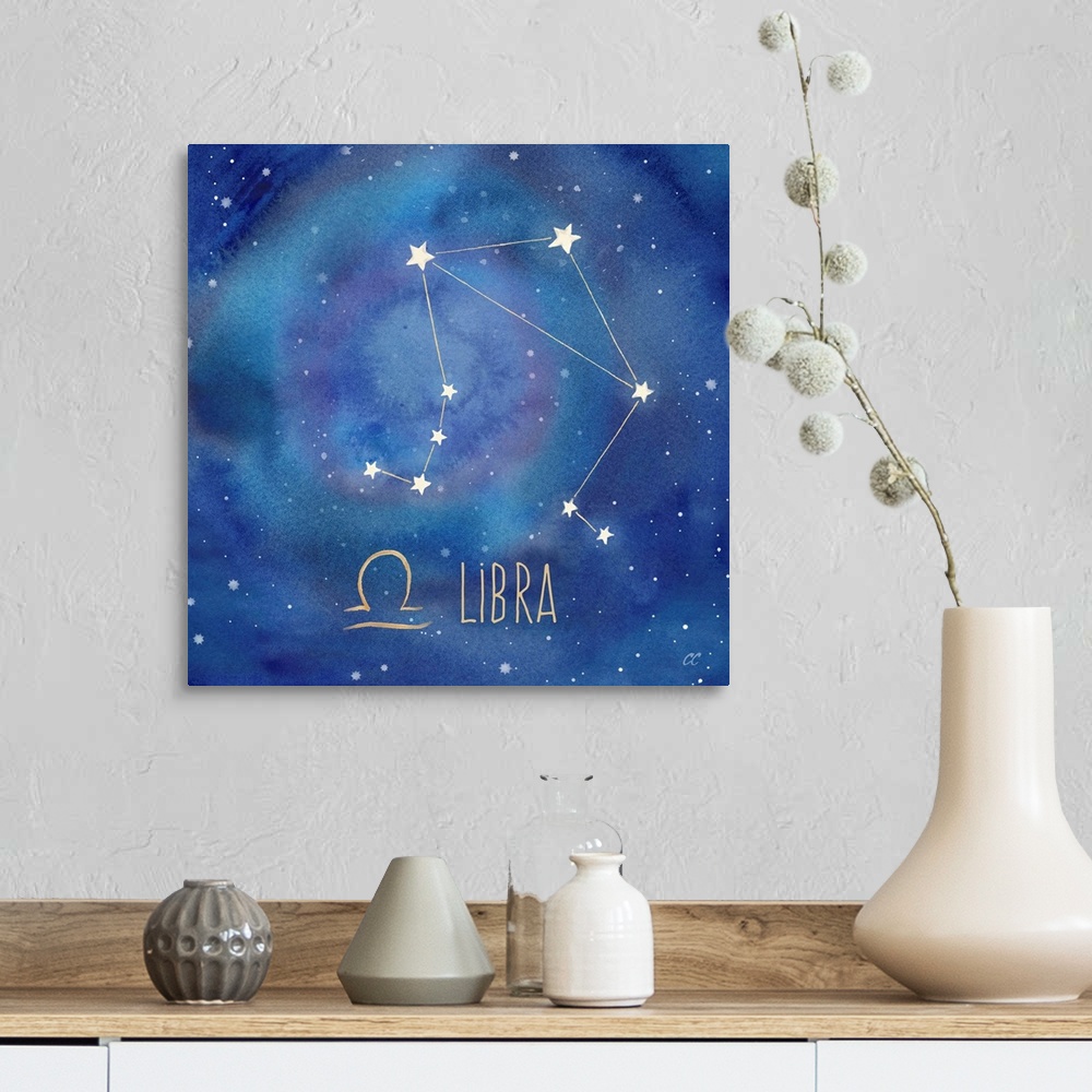 A farmhouse room featuring Square artwork of the constellation of Libra with the symbol.