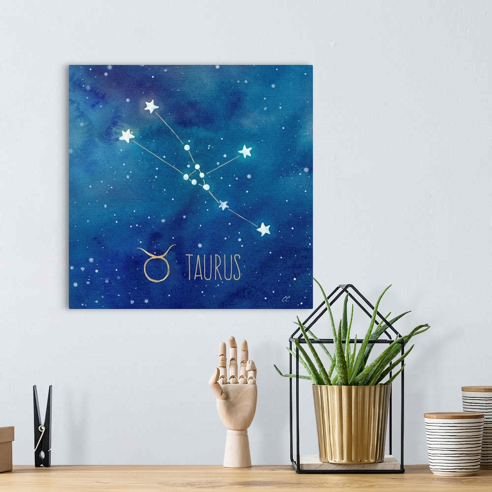 A bohemian room featuring Square artwork of the constellation of Taurus with the symbol.