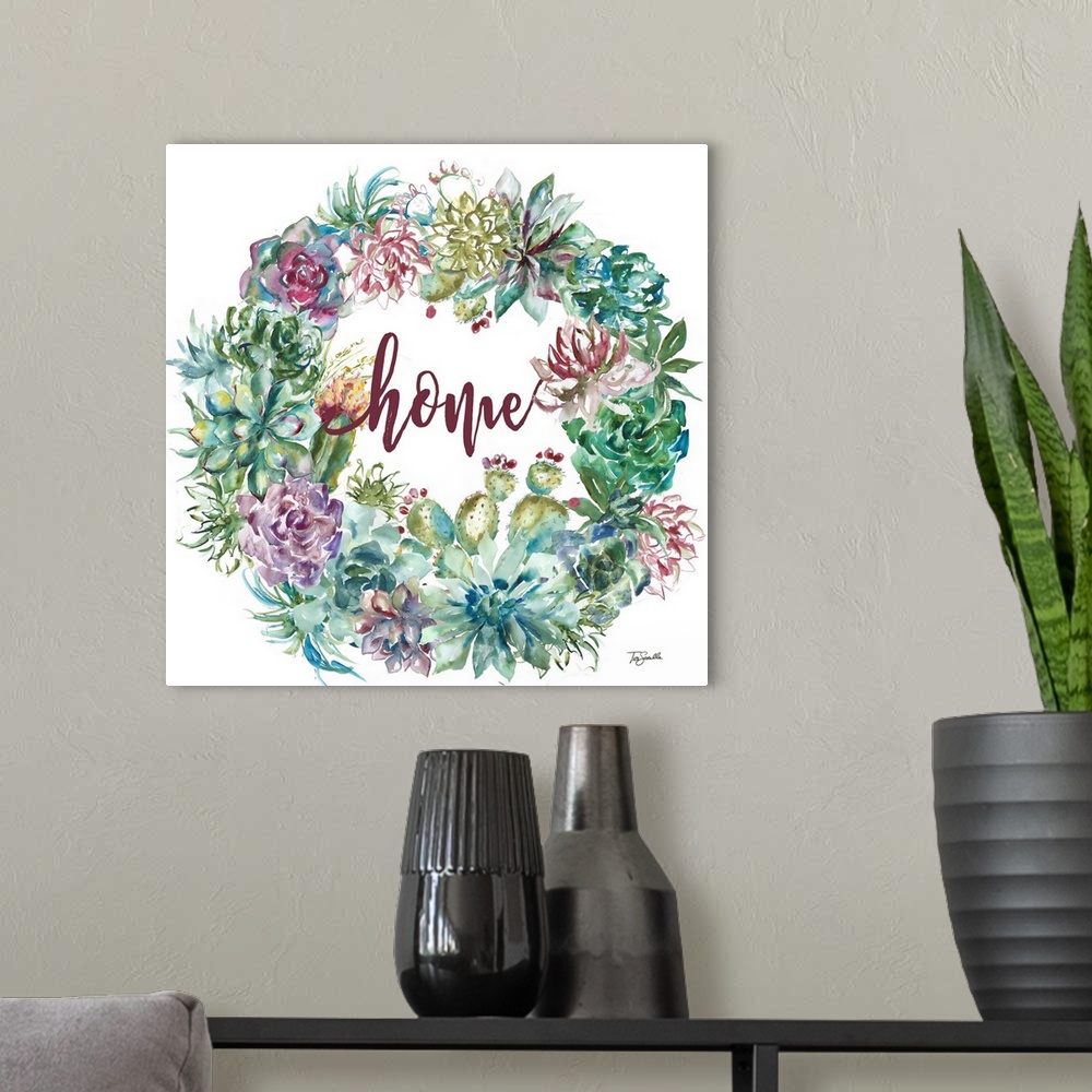 A modern room featuring "Home" on a square decorative watercolor painting of a wreath of colorful succulents.