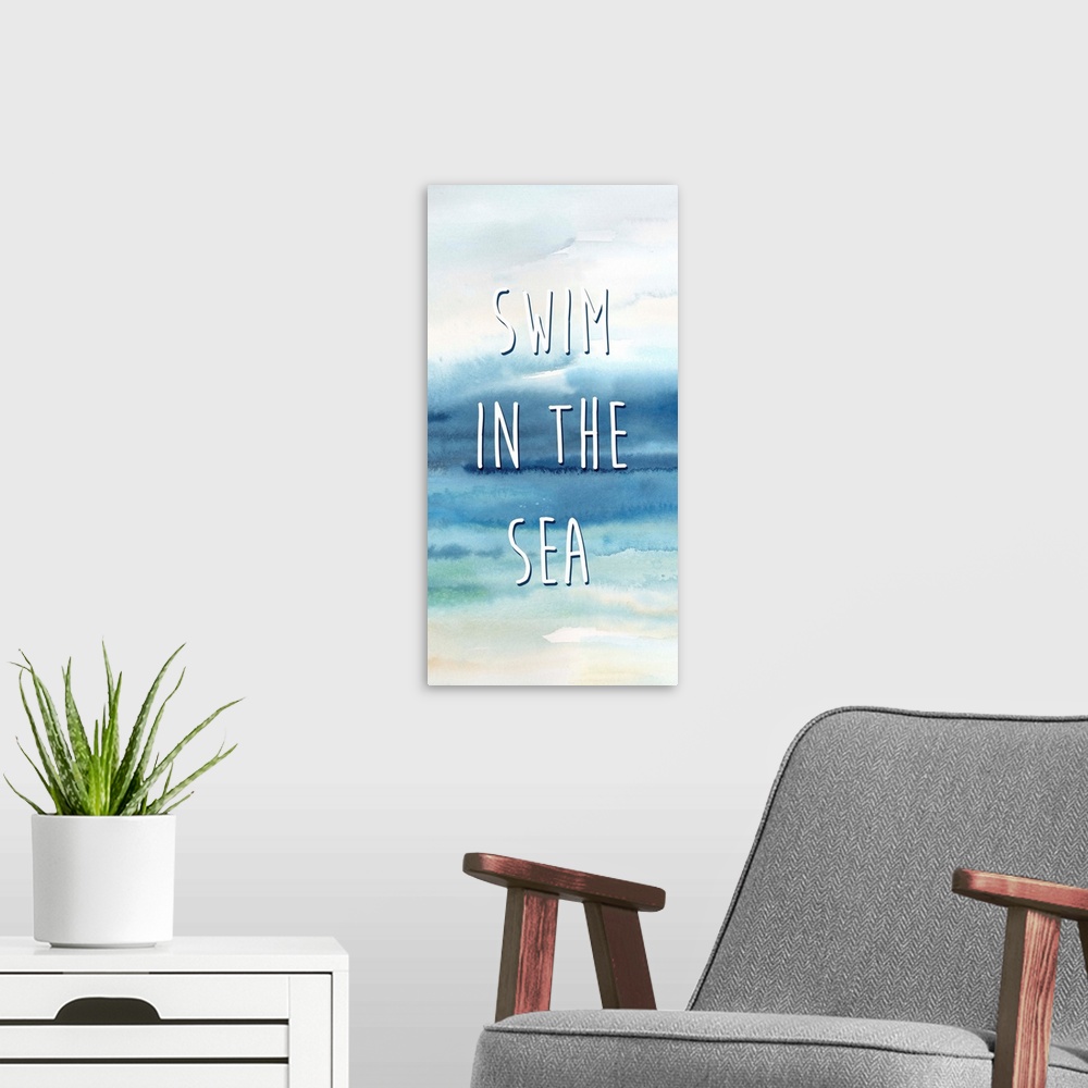 A modern room featuring "Swim In The Sea" in white on a watercolor painting of the ocean.