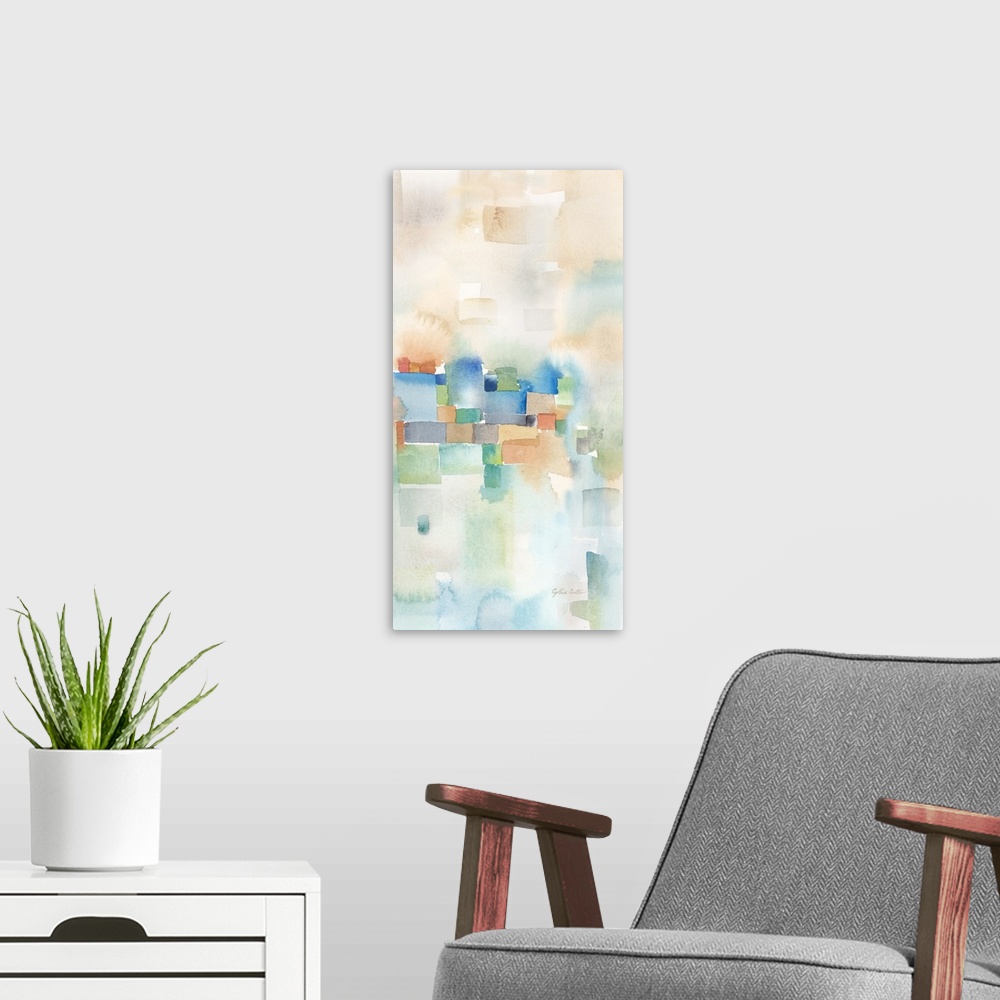 A modern room featuring Abstract watercolor painting in blurred square shapes in muted tones of orange, blue and green.
