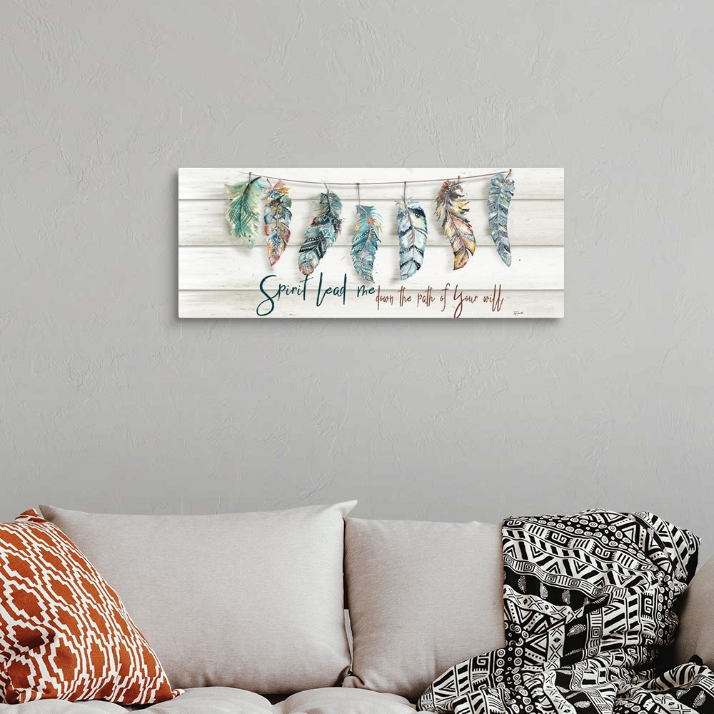 A bohemian room featuring A watercolor design of a row of feathers with tribal patterns and the text "Spirit Lead me down t...