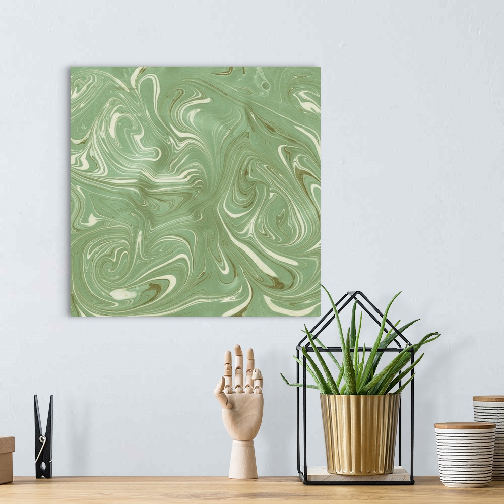 A bohemian room featuring Square abstract artwork of swirls of green and white shades in a marble effect.