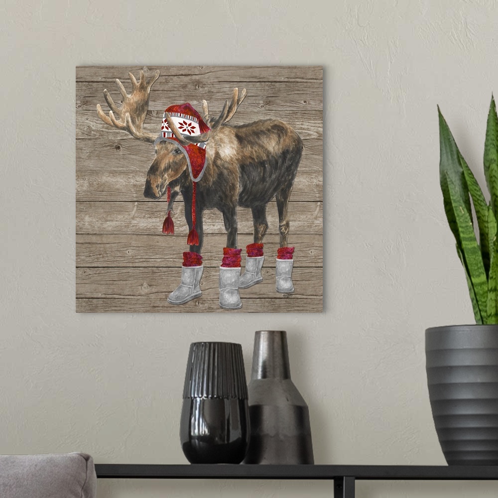 A modern room featuring Decorative image of a buck wearing a red cap and boots with red socks against a wood panel backdrop.