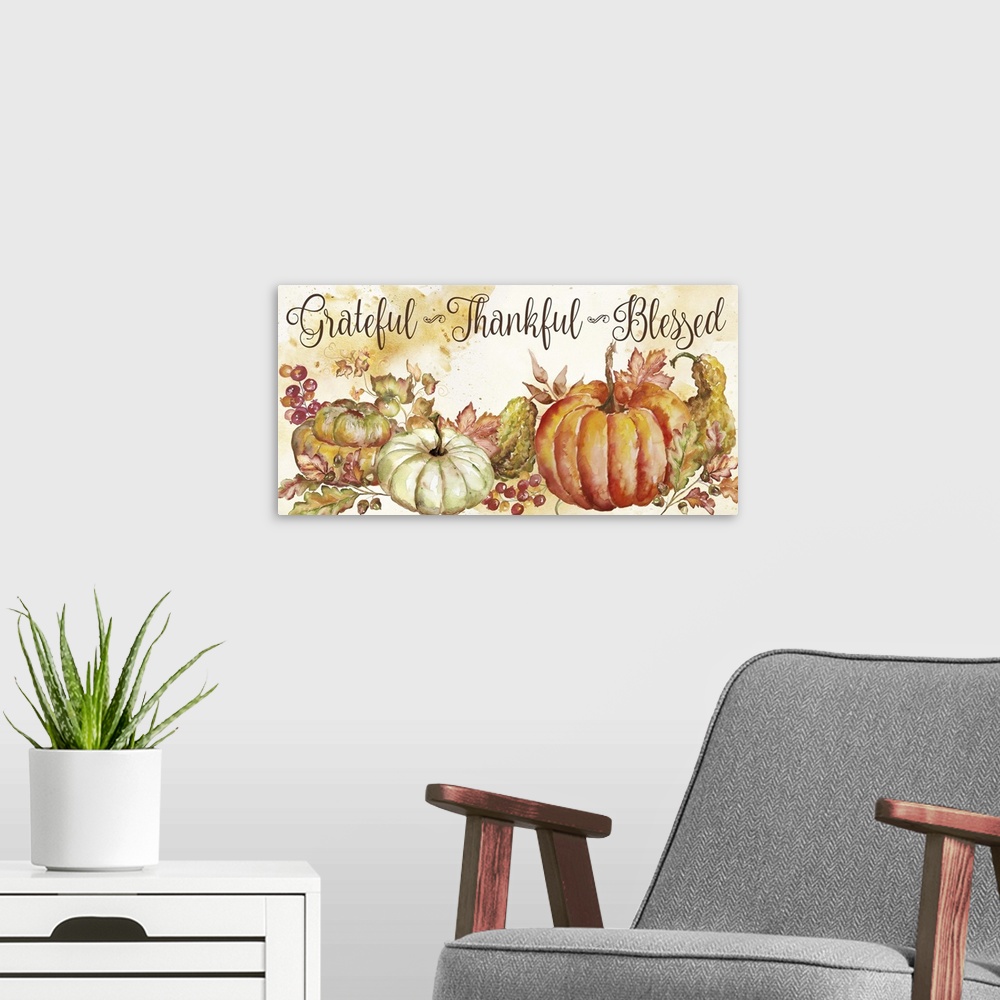 A modern room featuring Grateful, Thankful, Blessed on a watercolor painting of a group of pumpkins and gourds with autum...