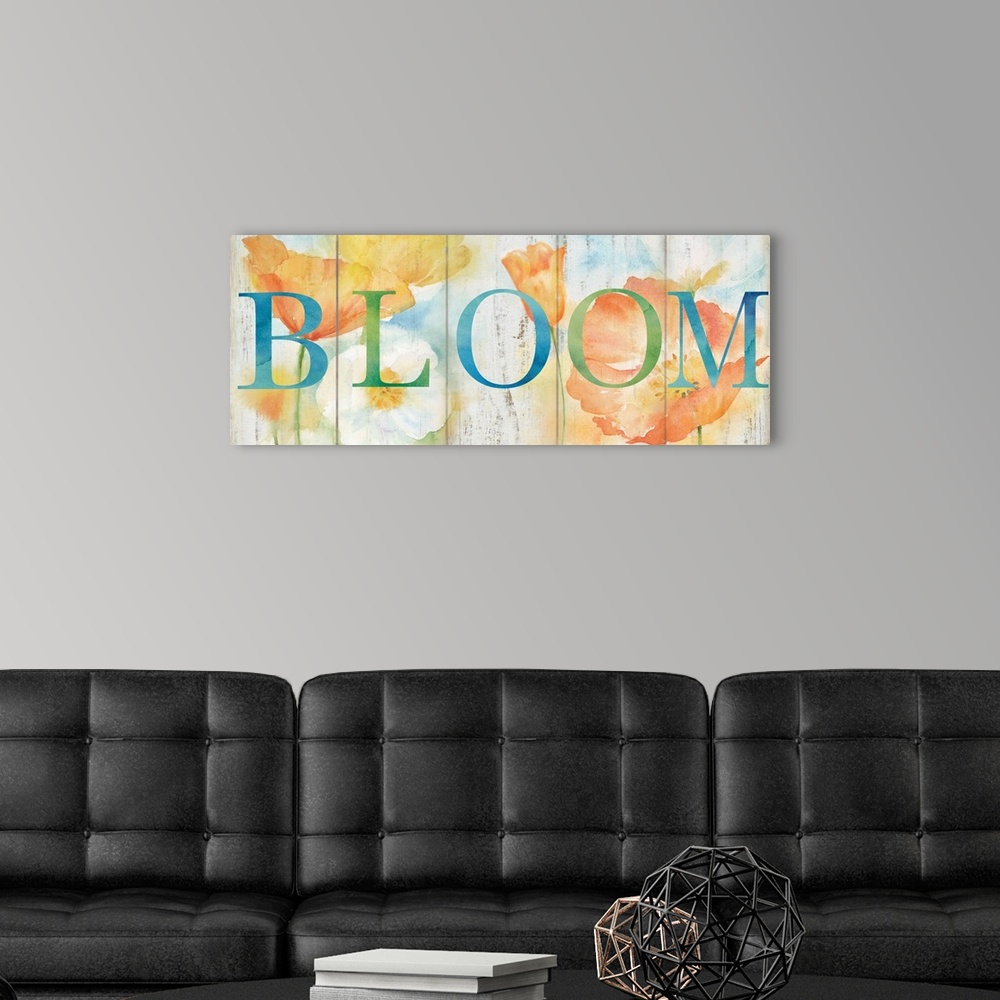 A modern room featuring "Bloom" in blue and green over a watercolor image of white, orange and yellow flowers with a wood...