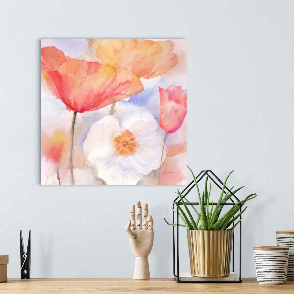 A bohemian room featuring Square watercolor painting of colorful poppies in washed, muted tones.