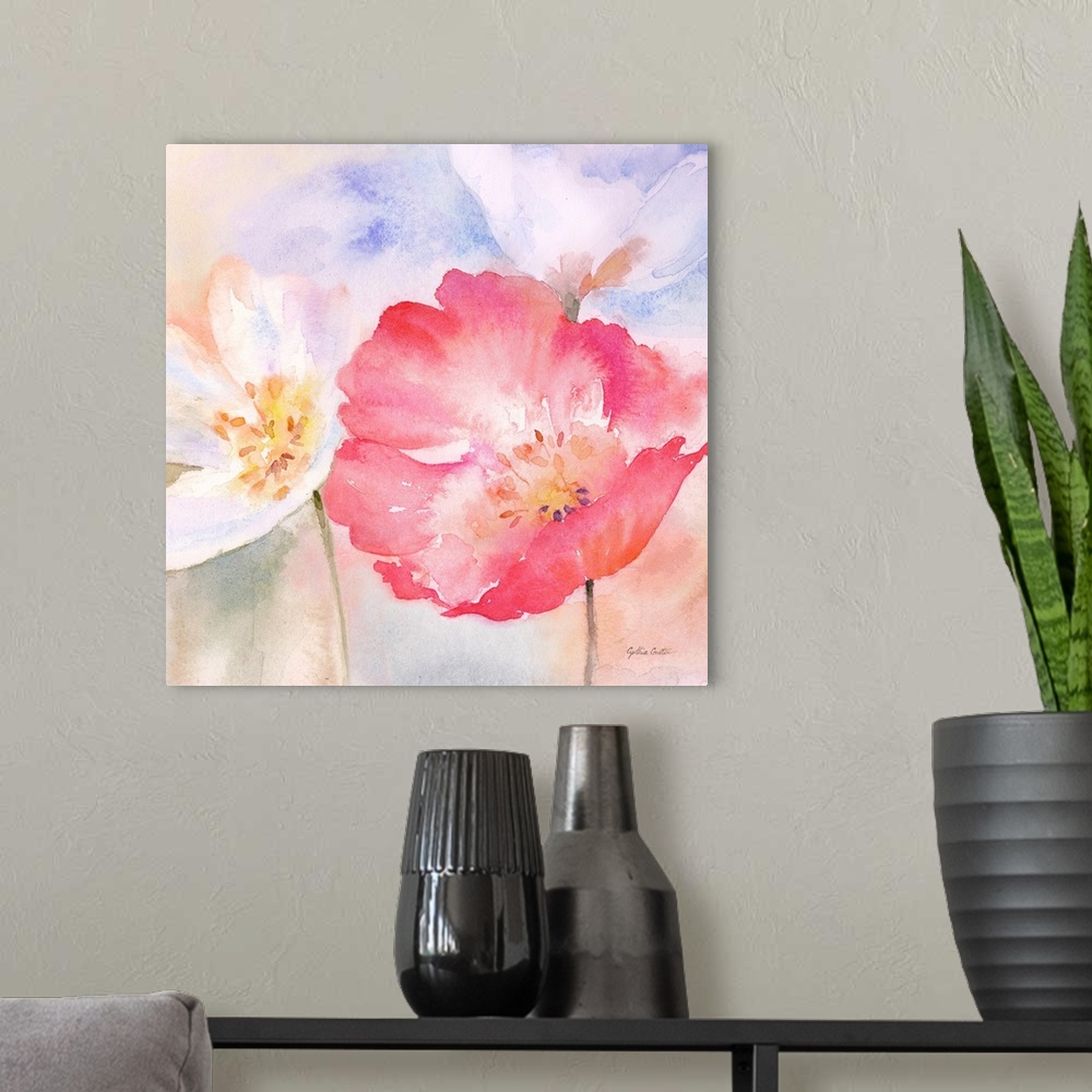 A modern room featuring Square watercolor painting of colorful poppies in washed, muted tones.
