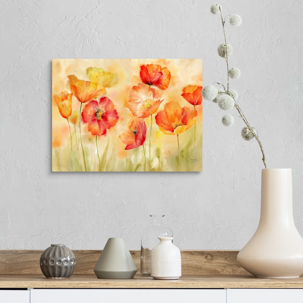 A farmhouse room featuring A bright watercolor painting of red, orange and yellow poppies against a faded orange and green b...