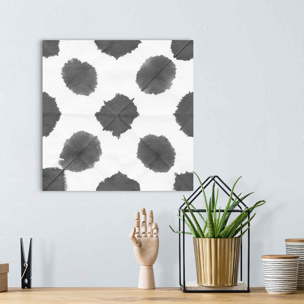 A bohemian room featuring Square decorative artwork of watercolor grey spots in rows on a white background.