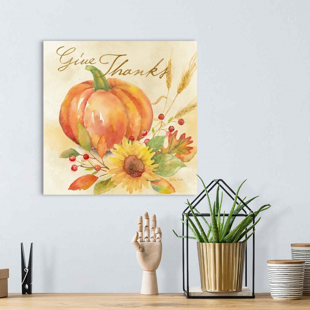 A bohemian room featuring "Give Thanks" with a pumpkin and autumn flowers in warm shades.