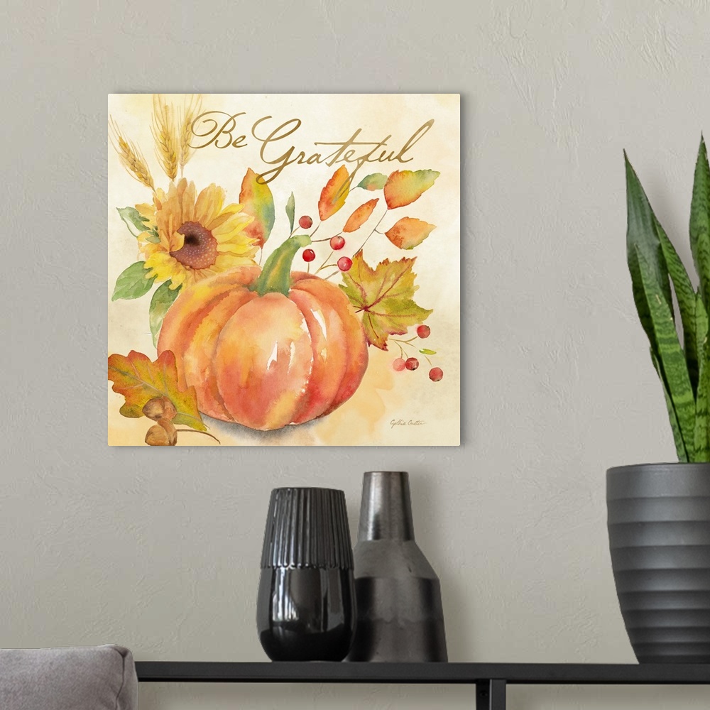 A modern room featuring "Be Grateful" with a pumpkin and autumn leaves in warm shades.