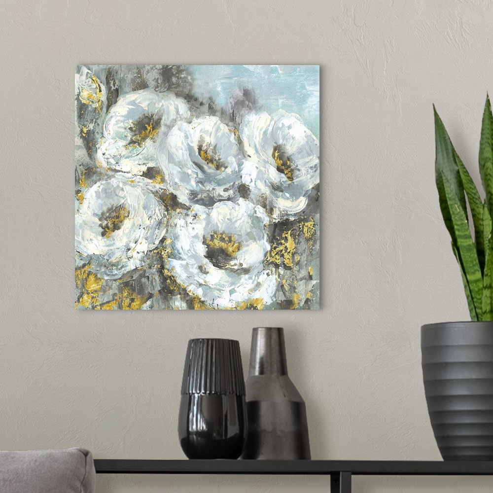 A modern room featuring Square contemporary painting of a group of white flowers with a textured effect and gold accents.