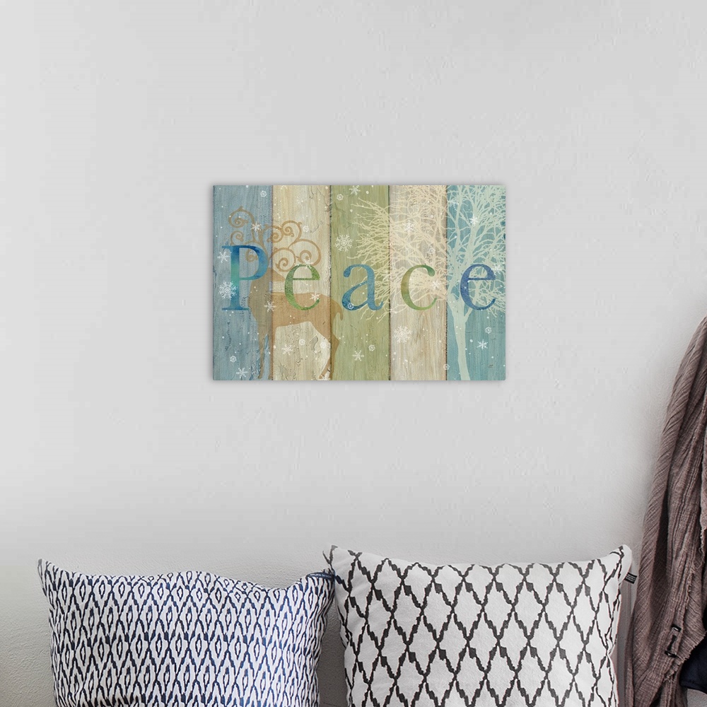 A bohemian room featuring "Peace" on a blue, green and tan wood panel background with a reindeer, tree and snowflakes.