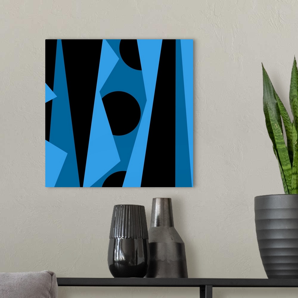 A modern room featuring Geometric abstract design in blue and black.