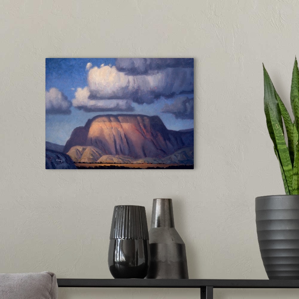 A modern room featuring Landscape painting of Carmichael Butte