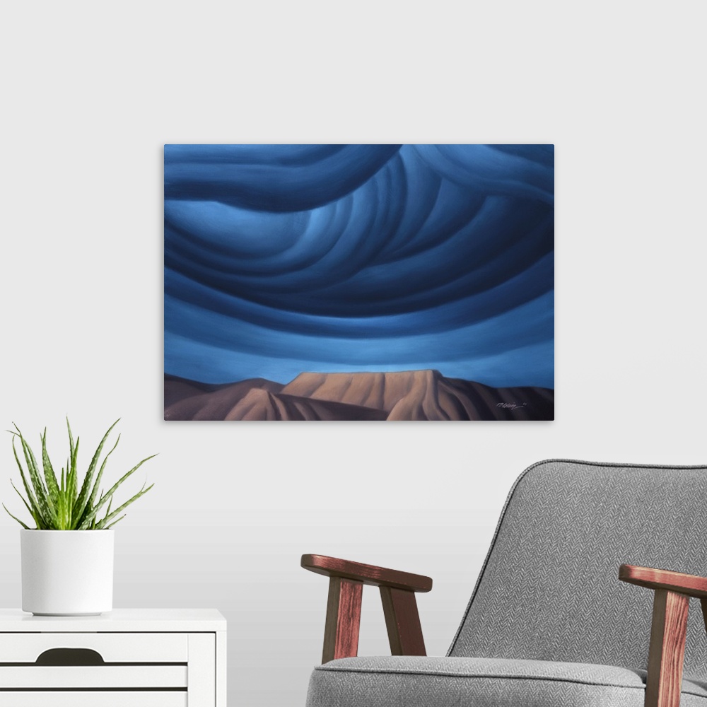 A modern room featuring Modernist landscape painting of cobalt blue clouds forming over a mountainous rock formation.