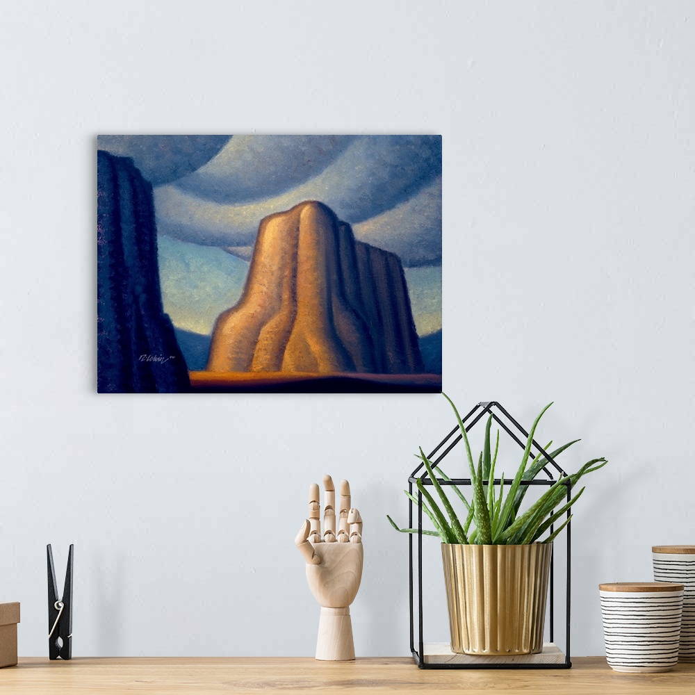 A bohemian room featuring Contemporary painting of a desert butte.
