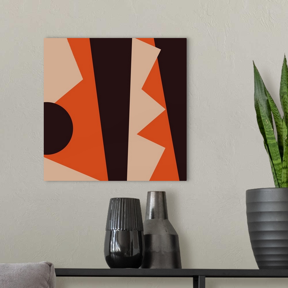A modern room featuring Geometric abstract design in black and orange.