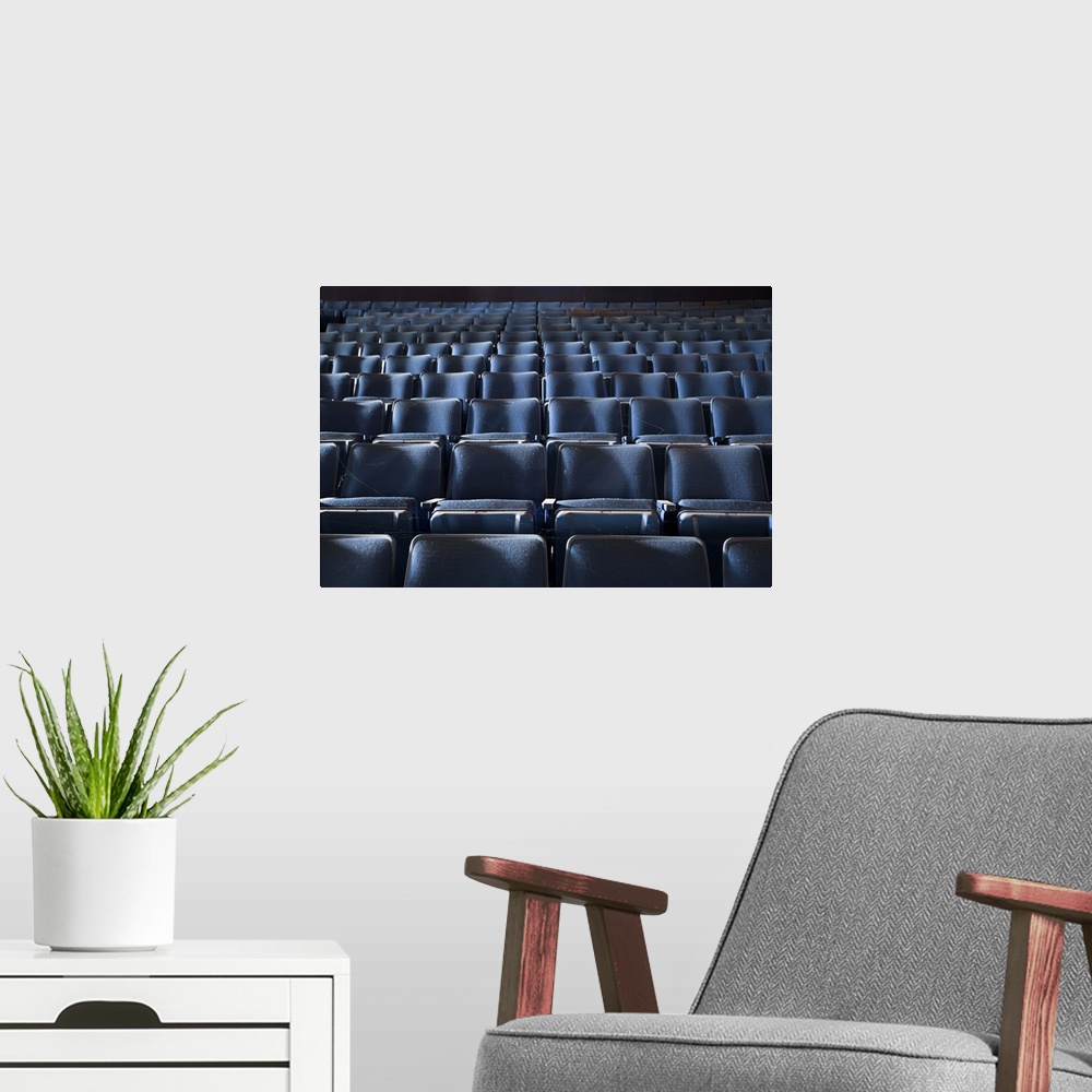 A modern room featuring Blue Theater Chairs