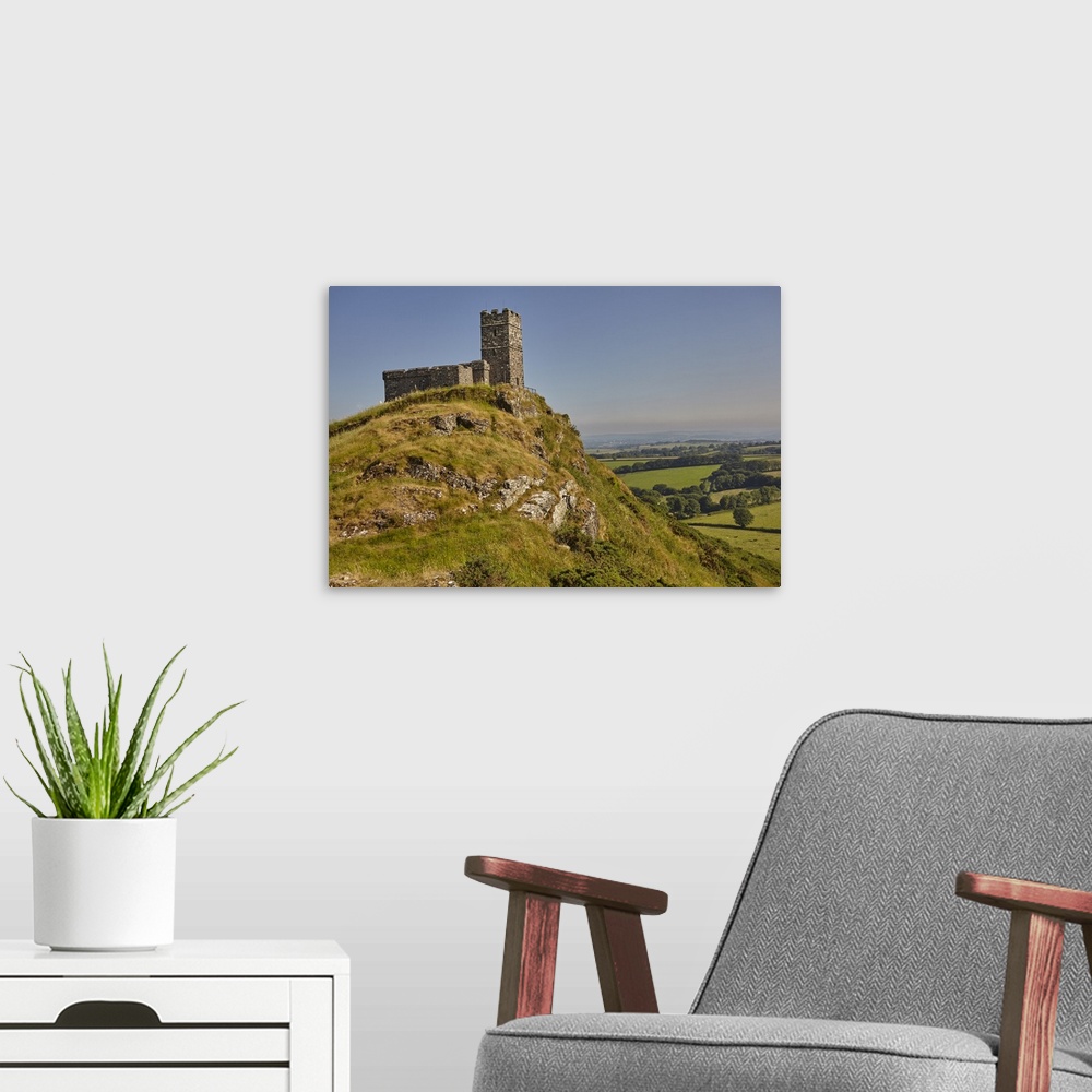 A modern room featuring An iconic Dartmoor view of the 13th century St. Michael's Church on Brent Tor, on the western edg...